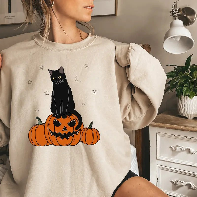 Black Cat On Pumpkin Sweatshirt, Halloween Sweatshirt, Black Cat Sweatshirt, Black Cat Shirt, Spooky Season Shirt, Pumpkin Halloween Shirt, Funny Pumpkin Face Shirt, Fall Halloween Gift Shirt