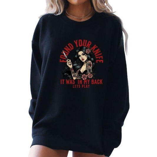 Black Crewneck Sweatshirt with Tatted Woman Holding Knife - "I Found Your Knife, It Was in My Back" - Grunge, Alternative, Edgy Vibe - Unisex Sizing - Perfect for Bold Fashion Statements, Rebellious Style, Unique Graphic Design - Stand Out with Attitude