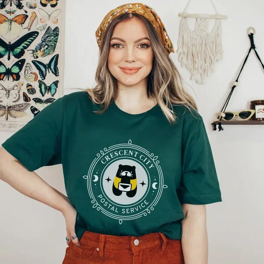 Crescent City Postal Service T-Shirt, Otter Messenger Sweatshirt, Sarah J Maas Tharion Mer House of Earth and Blood Sky and Breath Bryce Womenswear Tee