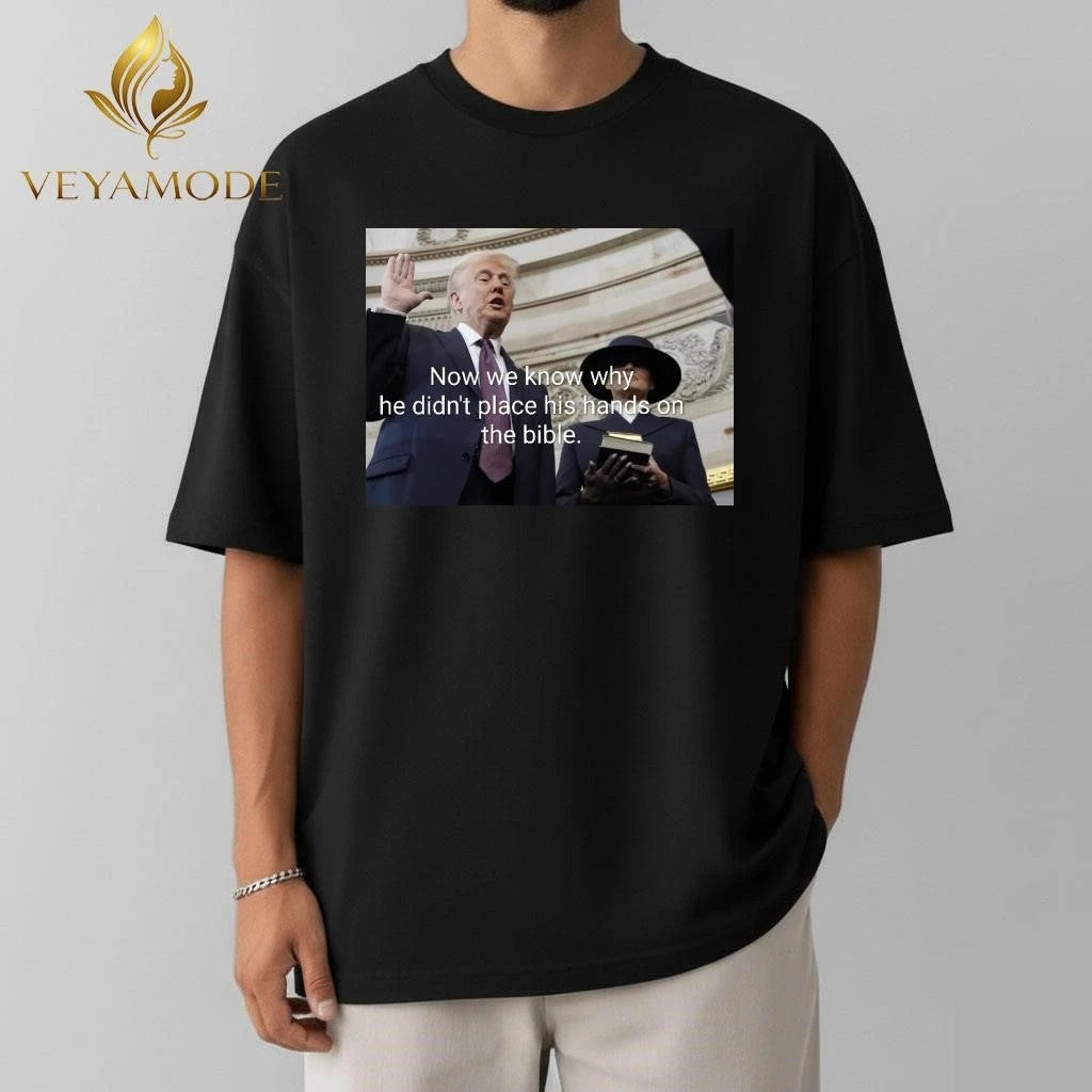 Now we know why he didn’t place his hands on the bible Trump tee