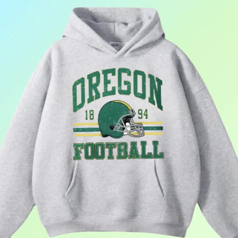 Oregon Ducks Hoodie, Classic Team Logo with Mascot Graphic, Cozy White Pullover for Unisex Fan Wear, Perfect for Game Day and Everyday Style, Support Oregon with Pride Cotton Tops