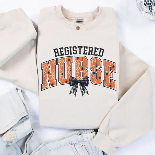 Registered Nurse Halloween Shirt, Halloween Nurse Sweatshirt, Nurse Bow Shirt, Registered Nurse Gift, Halloween Nursing Student Shirt, Unisex Shirt In All Sizes And Colors