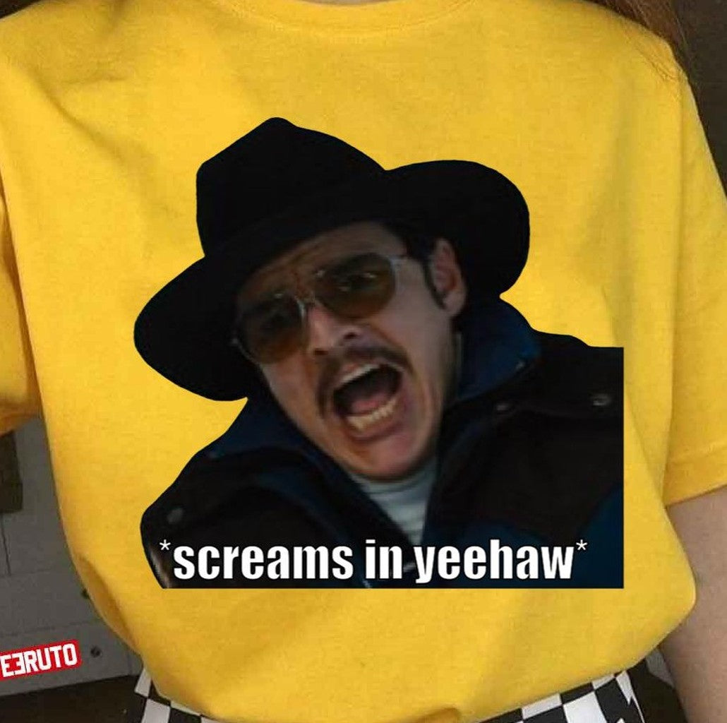Screams In Yeehaw Kingsman Whiskey Agent Pedro Pascal Unisex T-Shirt Hoodie, Sweatshirt | VibeTeeNation.com (Image 1)