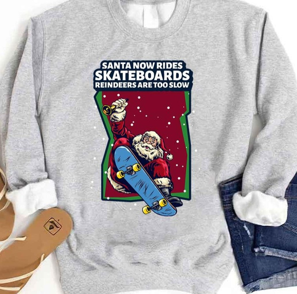 Santa Now Rides Skateboards Reindeer Are Too Slow Unisex Sweatshirt T-Shirts, Hoodie | VibeTeeNation.com (Image 1)